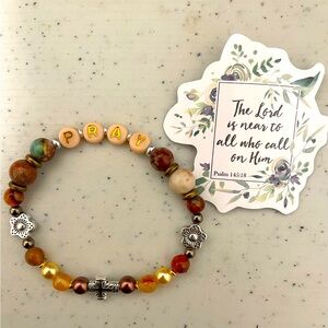Pray bracelet in earth tones with gold and silver